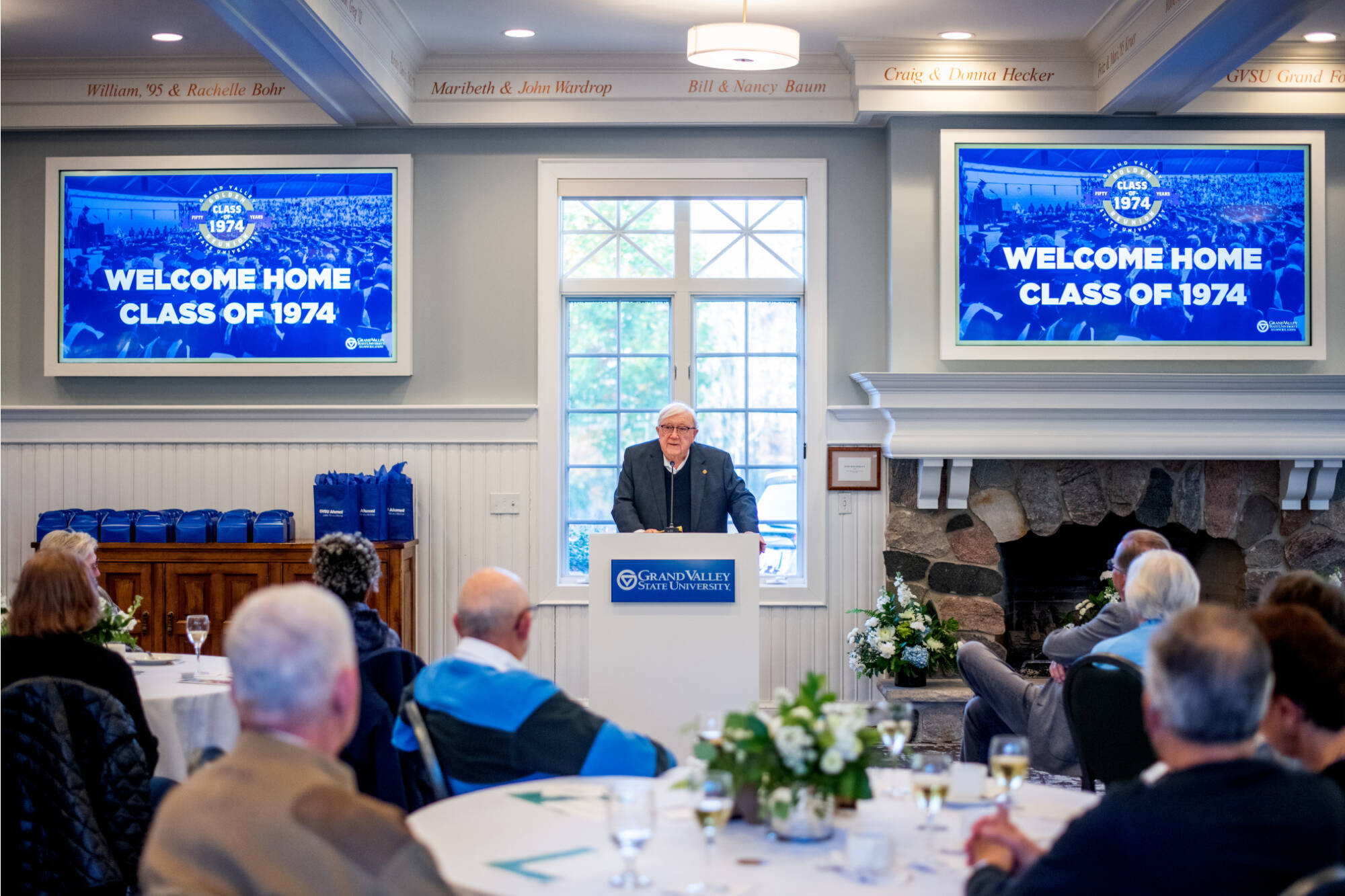 President Emeritus Don Lubbers speaks with the class of 1974 during their golden reunion during homecoming events November 2 at the Alumni House.